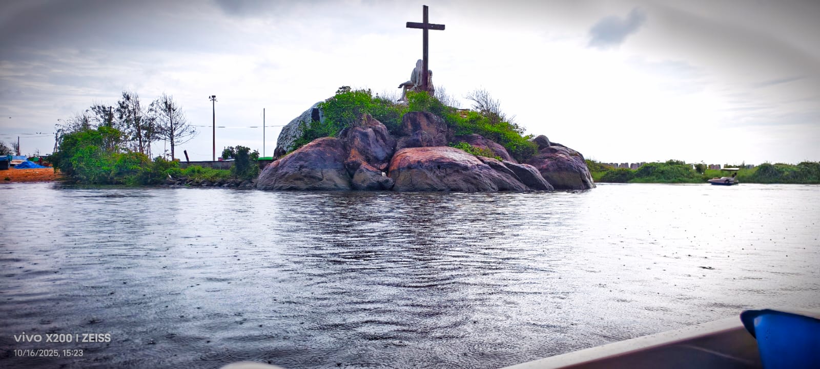 Backwater rock shrine in the rain